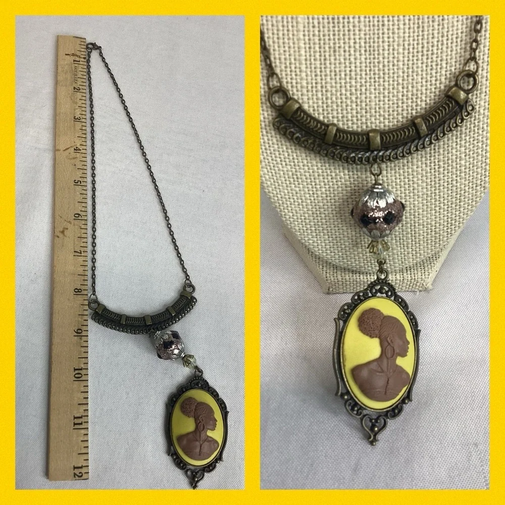 Yellow and brown cameo necklace.